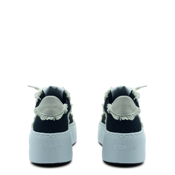 Wave fringes black shoe
